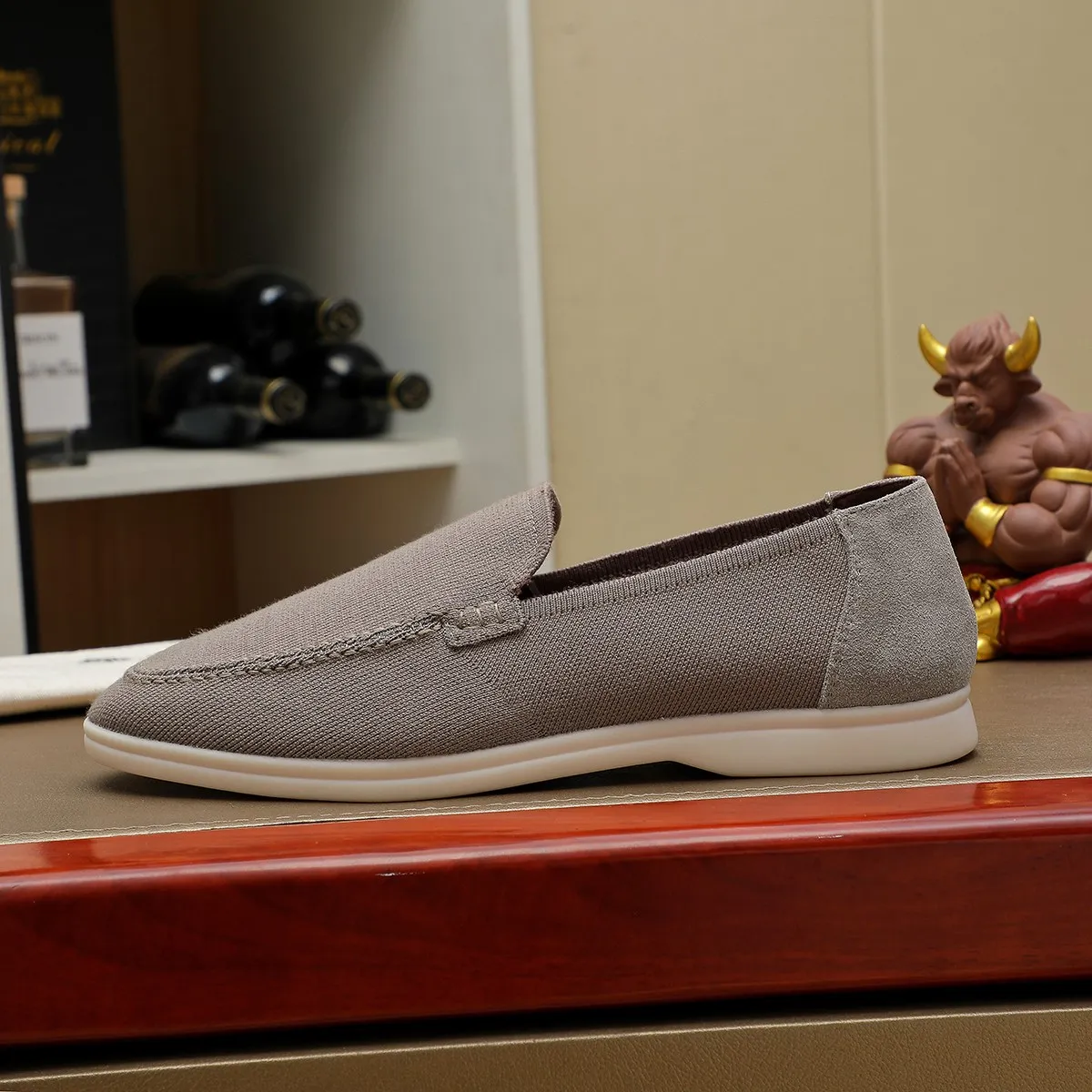 Men's Men's Shoes 💰 400 Loro PIana moccasin made of wish wool fabric. The upper is made of knitted fabric, made on a loom, and then attached to a rubber sole. The Rain System's water-repellent treatment enhances the shoe's functional design, while the suede details give the shoe a sense of elegance and sophistication. Made from Wish, fine wool from Australian and New Zealand Merino sheep 38-44